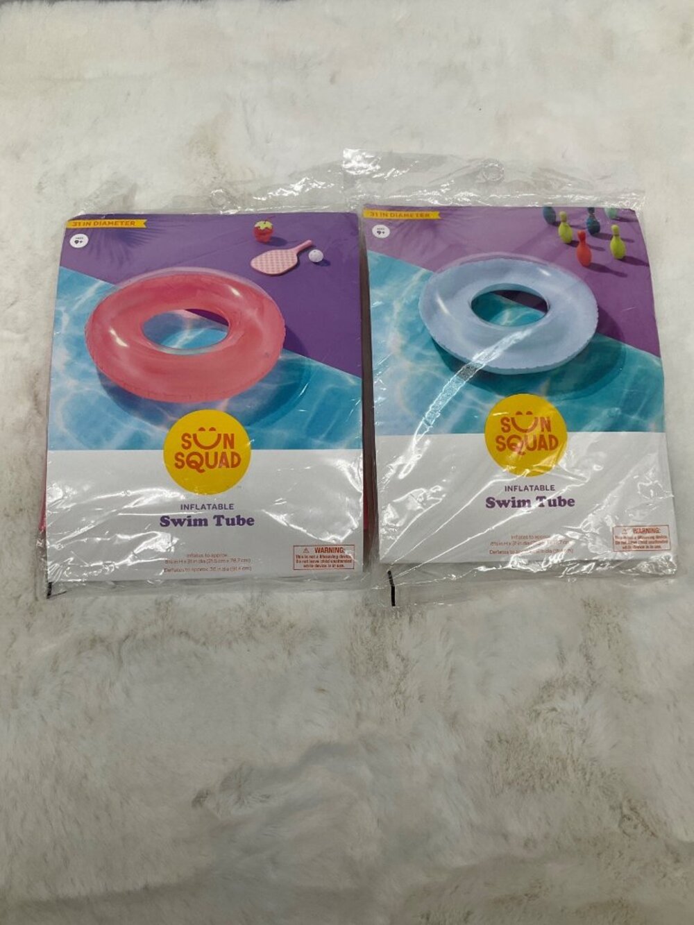 Sun Squad- 2 pack  31" diameter inflatable swim tubes, pink & blue NEW